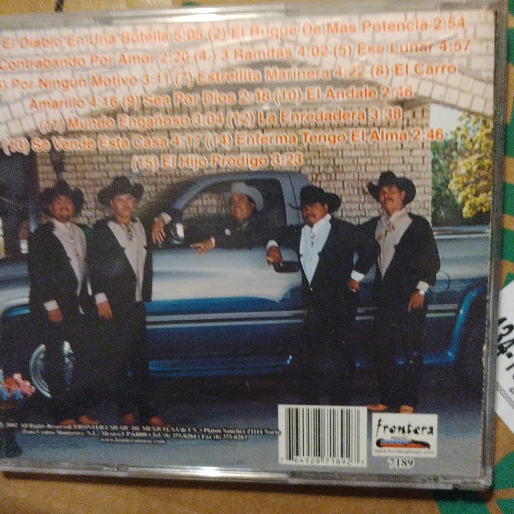 Frontera Music CD with Band in Black Suits